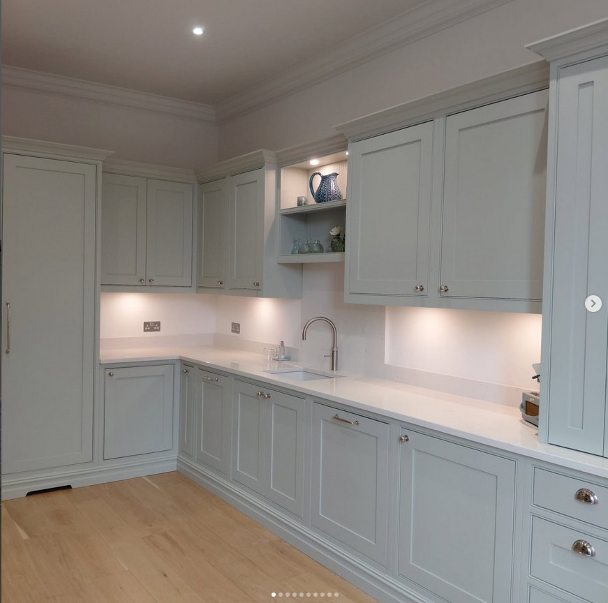 Handmade kitchen in soft blue with traditional styling